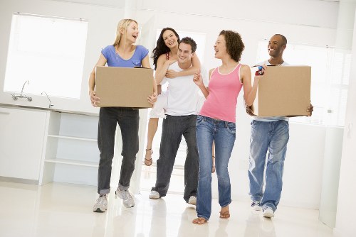 Local home moving team working in Putney with boxes and furniture