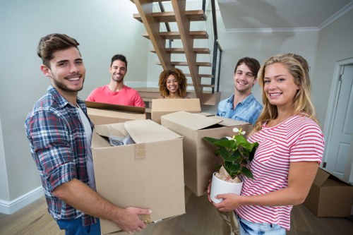 Office moving team preparing equipment for a commercial relocation in Putney