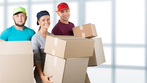 Packing and loading household items for a Putney home move