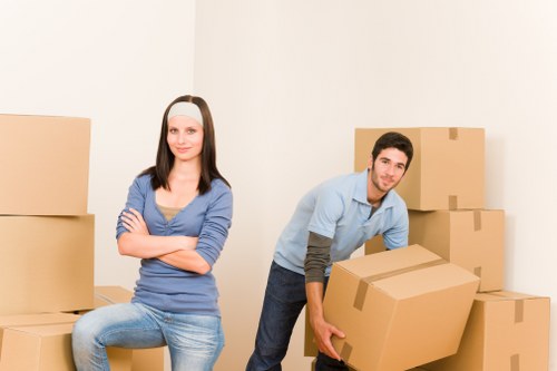 Household furniture and packed boxes prepared for a Putney move