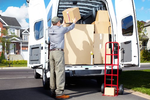 Furniture and boxes being loaded for a same day move in Putney