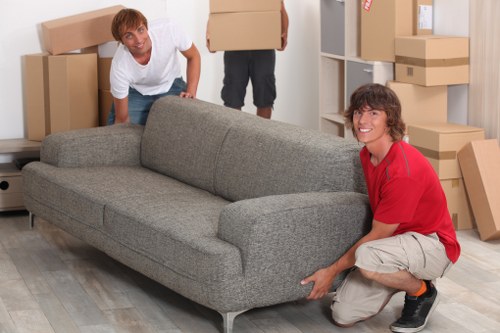Packing and organising office items before a move in Putney