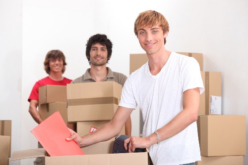 Local removal service loading items for a Putney apartment move